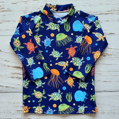 Remera UV Tortugas