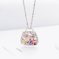 CL0067 - DIJE PLATA 925 RODINADO Y PERLA CRISTAL - Espíritu Joyas Mayorista