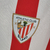 Camisa Titular Athletic Bilbao home 22/23 new balance s/n° vermelho e branco masculina versão torcedor em la liga