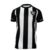 Camisa Botafogo I 23/24 preto e branco: faixas horizontais em preto e branco, escudo do Botafogo no peito. Uma peça de colecionador para torcedores apaixonados. Explore as fotos e encante-se com esse visual icônico. Adquira já a sua camisa alvinegra!