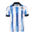 Camisa-Titular-Real-Sociedad-Home-23-24-Macron-Branco-e-Azul-Masculina-Torcedor-La-Liga-Futebol-Espanhol-Los-Txuri-urdin-