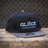 Gorra Glück Negro/Celeste