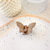 Broche mariposa color 4x2cm beige