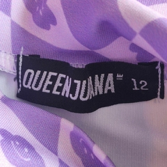 REMERA DE AGUA - QUEEN JUANA - TALLE 12 AÑOS - LILA Y ROSA CON MOTIVO CUADRICULADO Y FLORES en internet