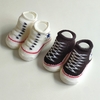 MEDIAS - CONVERSE - TALLE 0 A 3 MESES - BOTITAS X2 UNIDADES (NEGRO Y BLANCO)