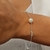 PULSERA DE PERLA DE RIO Y BOLITAS