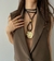 Collar Mantra bronce