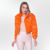 Urbanchic Bomber Jacket - Rabbit Fur and Goat Leather Coat with Collar, Pocket, Snap Button Closure. Warm Neckline for Autumn/Winter Cold. Sophisticated and Casual. Fabiane Frank Fur and Shop 2024 2025. Orange Front.