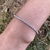 Pulsera tennis ajustable en Plata 925 rodinada con cubics