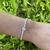 Pulsera tennis con corazoncito en Plata 925 y cubics