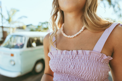 Collar caracoles blanco/rosa