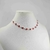 Colar choker círculos cravejado vermelho