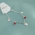 Pulseira Sol + 2 Strass Rubi - comprar online