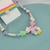 conjunto infantil 3 em 1 - Colar, kit de pulseiras e laço - flor sorriso e circulo Oval - comprar online