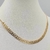 Colar choker folhas vazada dourada - comprar online