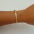 Bracelete C Dourado 58mm - comprar online