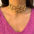 Colar Choker Estruturada Silvia Dourada na internet