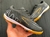 BOTIN NK AIR ZOOM PREMIUM FUTBOL 5 NEGRO/DORADO