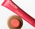 the coral duo Pocket Blush + Peptide Lip Tint Rhode Skin