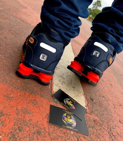 Nike shox nz laranja sales