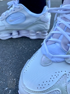 Nike 12s molas centauro preço sale