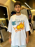 Camiseta Approve Oversized Doodle Branca na internet