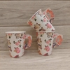 TAZA CON FLORES