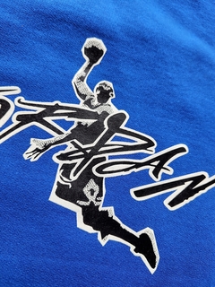 Buzo Michael Jordan azul en internet