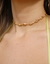 Chocker búzios dourado