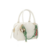 BOLSA PEQUENA EM COURO OFF WHITE COM CHARMS - comprar online