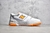 New Balance 550 - White Vibrant Orange - comprar online