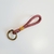 Chaveiro Charm Caqui e Bordo - comprar online