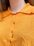 Camisa cropped com botões na internet