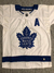 Camisa Jersey Toronto Maple Leafs - 91 John Tavares - 34 Auston Matthews - 16 Mitchell Marner - 44 Morgan Rielly - 16 Mitchell Marner - 88 William Nylander - loja online