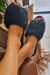 Pantufa de pelúcia Preta