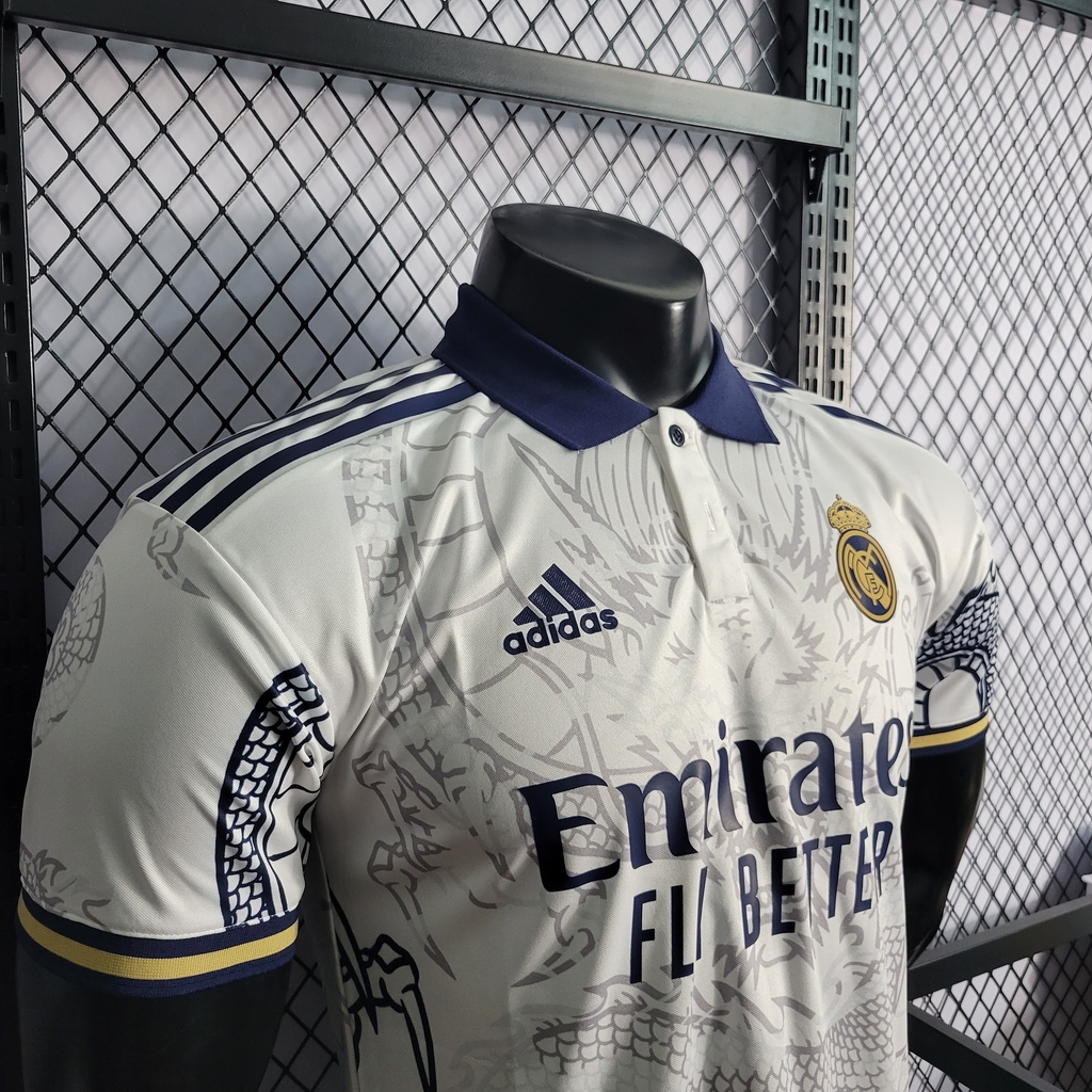 Camisa real madrid dragon clearance