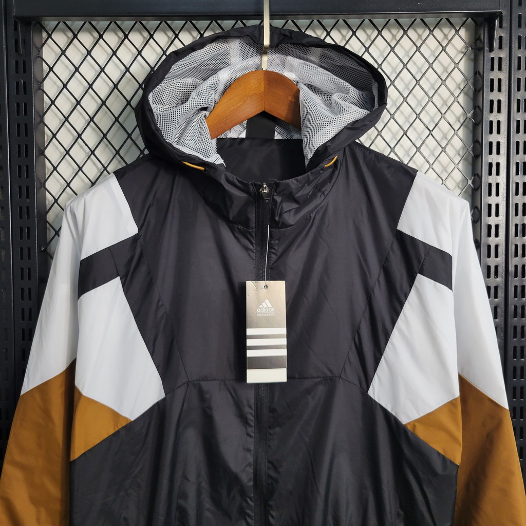Corta vento amarelo adidas 2025