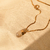 Collar LUZ COSMICA (Cuarzo rutilado con baño de oro)
