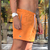 SHORT BEACHWEAR LACOSTE MH414823 - LARANJA