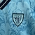 Athletic-Club-Bilbao-Infantil-2023-2024-Castore-camisa-reserva-azul-celeste-LALIGA-Copa-del-Rey-história-tradição-design-inspirador-leões-estádio-San-Mamés-detalhes-significativos-gola-V-azul-marinho-punhos-selo-especial-125-anos-País-Basco-Ikurriña. 