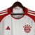 camisa-Bayern de Munique-titular-branca-manga vermelha-temporada-2023-2024-patrocínio-adidas-gola redonda-punhos brancos-escudo-logo-Deutsche Telekom-Allianz-três listras-detalhes vermelhos-inscrição-Rot & Weiß ein Leben lang-Mia San Mia-numeração-calção-