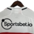 Camisa-branca-São-Paulo-Adidas-temporada-2023-2024-listras-horizontais-vermelho-preto-escudo-logo-da-Adidas-Sportsbet.io-calção-branco-meiões-brancos. 