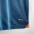 camisa-masculina-away-Puma-temporada-2023-2024-Valencia-azul marinho-linhas verticais-design-criatividade-arrojado-inovador-Geração Z-morcego-escudo-laranja-felino-TM Real Estate Group-calção-meiões. 
