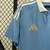 Camisa-Masculina-Bélgica-Home-Temporada-2024-2025-Patrocínio-Adidas-Tintim-Azul celeste-Gola pólo-Branco-Jacquard-Coroa-Nuca-Dourado-Logo-Escudo-Calção-Marrom-Meiões. 