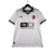  camisa-masculina-home-Puma-temporada-2023-2024-Valencia-branco-padrão gráfico-areia-Mar Mediterrâneo-gola pólo-preto-faixas-bege-escudo-felino-TM Real Estate Group-calção-meiões. 