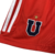 conjunto-infantil-away-reserva-Universidad-de-Chile-temporada-2023-2024-patrocínio-Adidas-camisa-vermelha-gola-recortada-botão-colarinho-mangas-escudo-logo. 