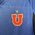 Universidad-Chile-masculino-treino-azul-detalhes-preto-Adidas-2023-2024-escudo-logo-gola-careca-mangas-recorte-listras-Climacool. 
