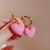 Brinco Heart Pink na internet