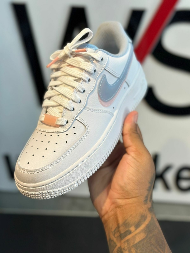 Pink blue and white best sale nikes