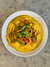 Risotto de ají amarillo y curry de vegetales